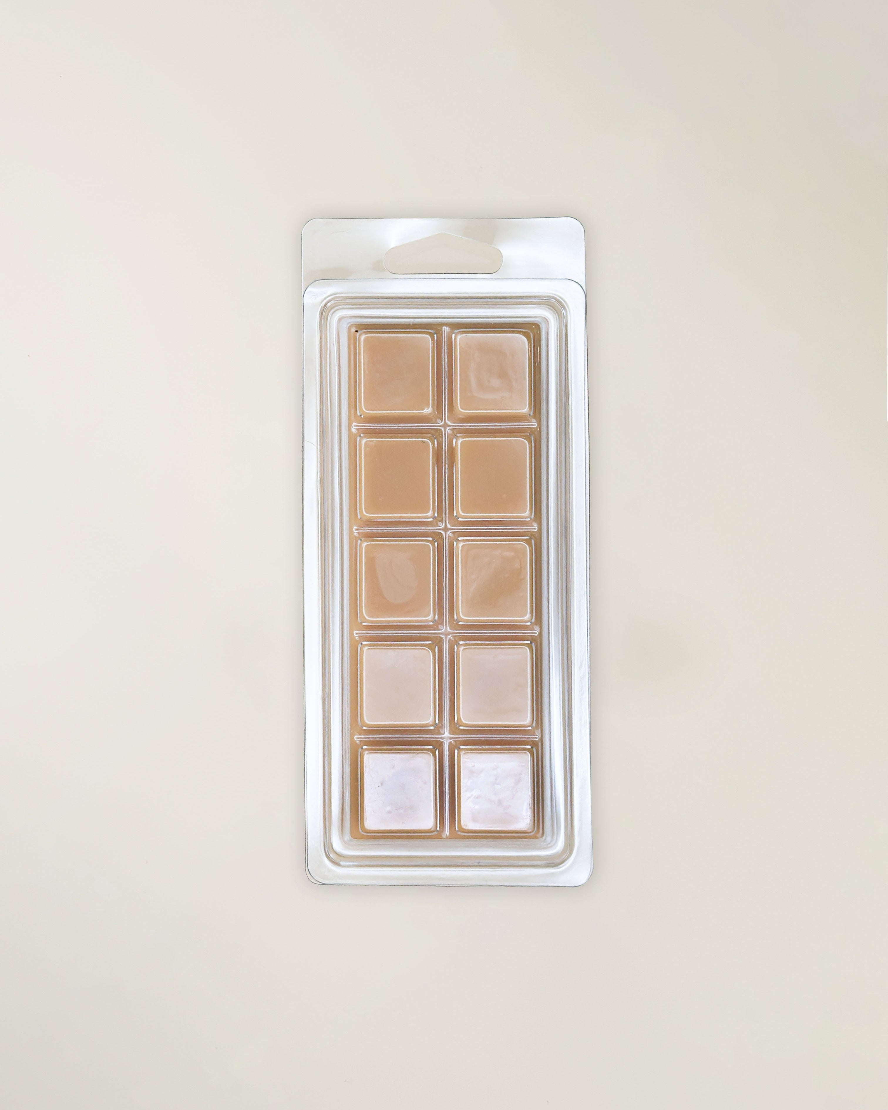 Back of wax melt package with beige wax