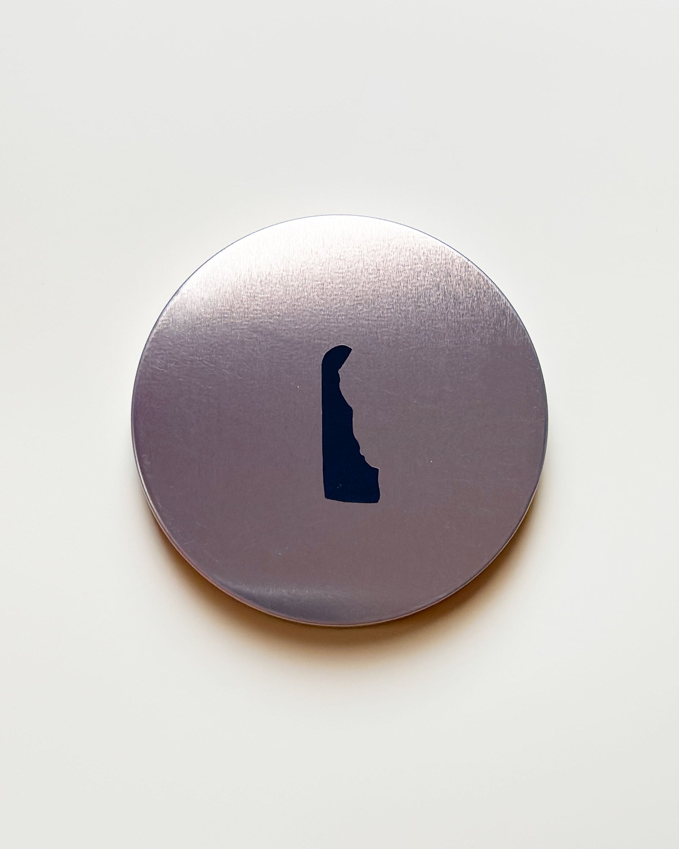 rose gold candle lid with delaware shaped match strike