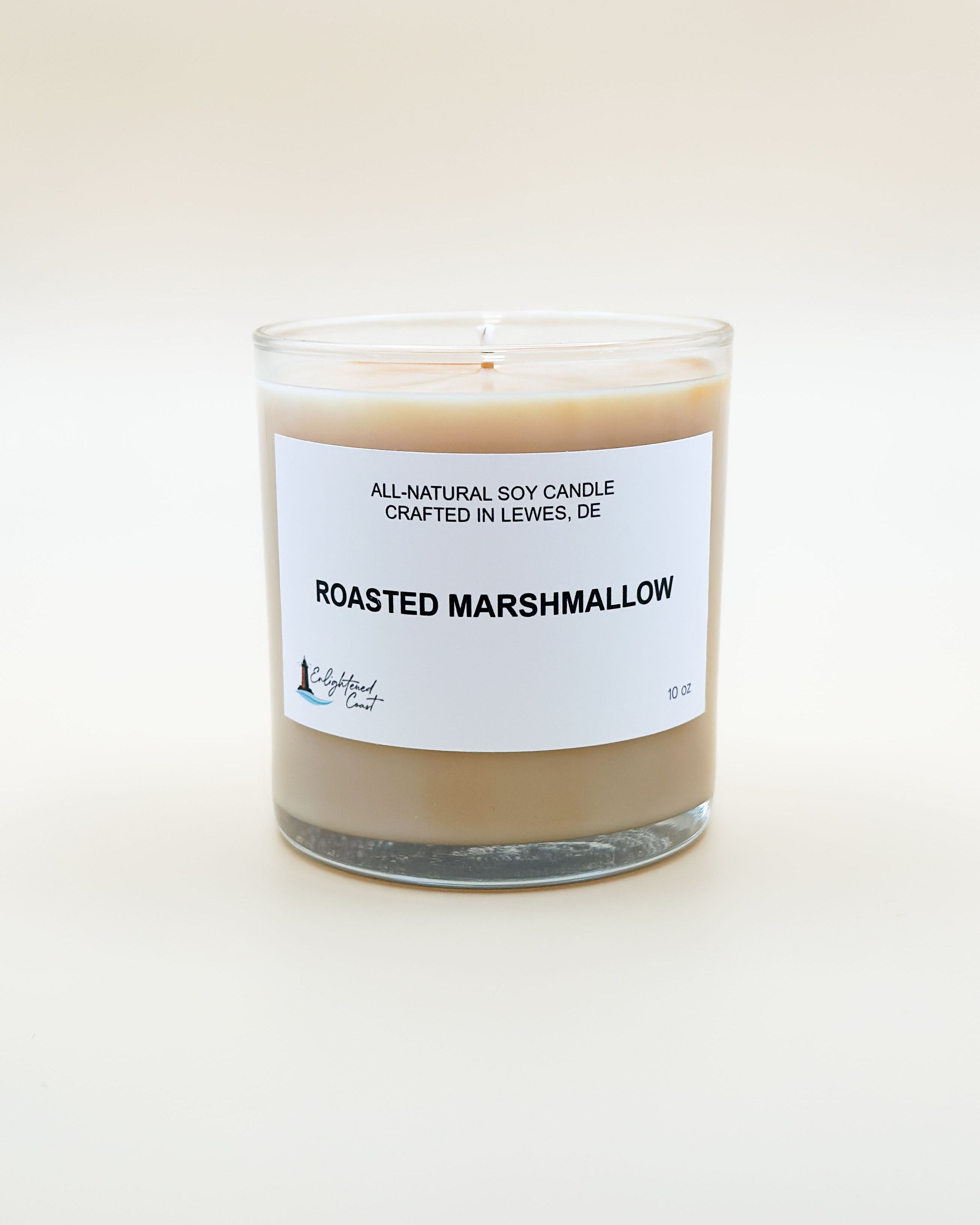 All-natural soy candle labeled 'Roasted Marshmallow' on a white background